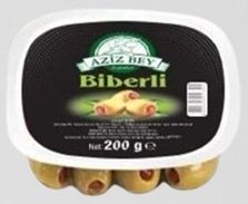 stuffed green olives with red pepper in vacuum packages 