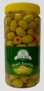 stuffed green olives with red pepper in pet jars 